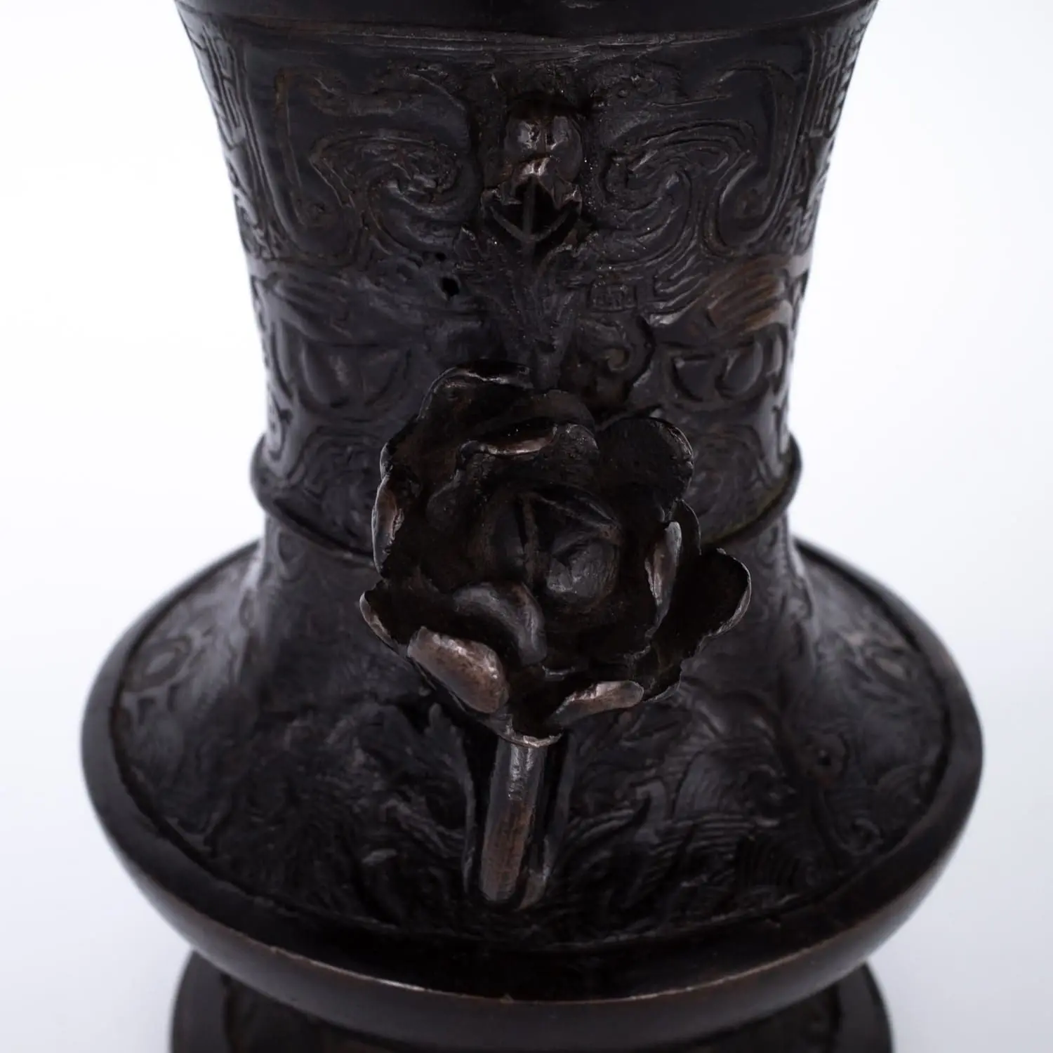 Antique Bronze Gu Form Altar Vase With Taotie Mask Decoration and Floral Handles. 19th century