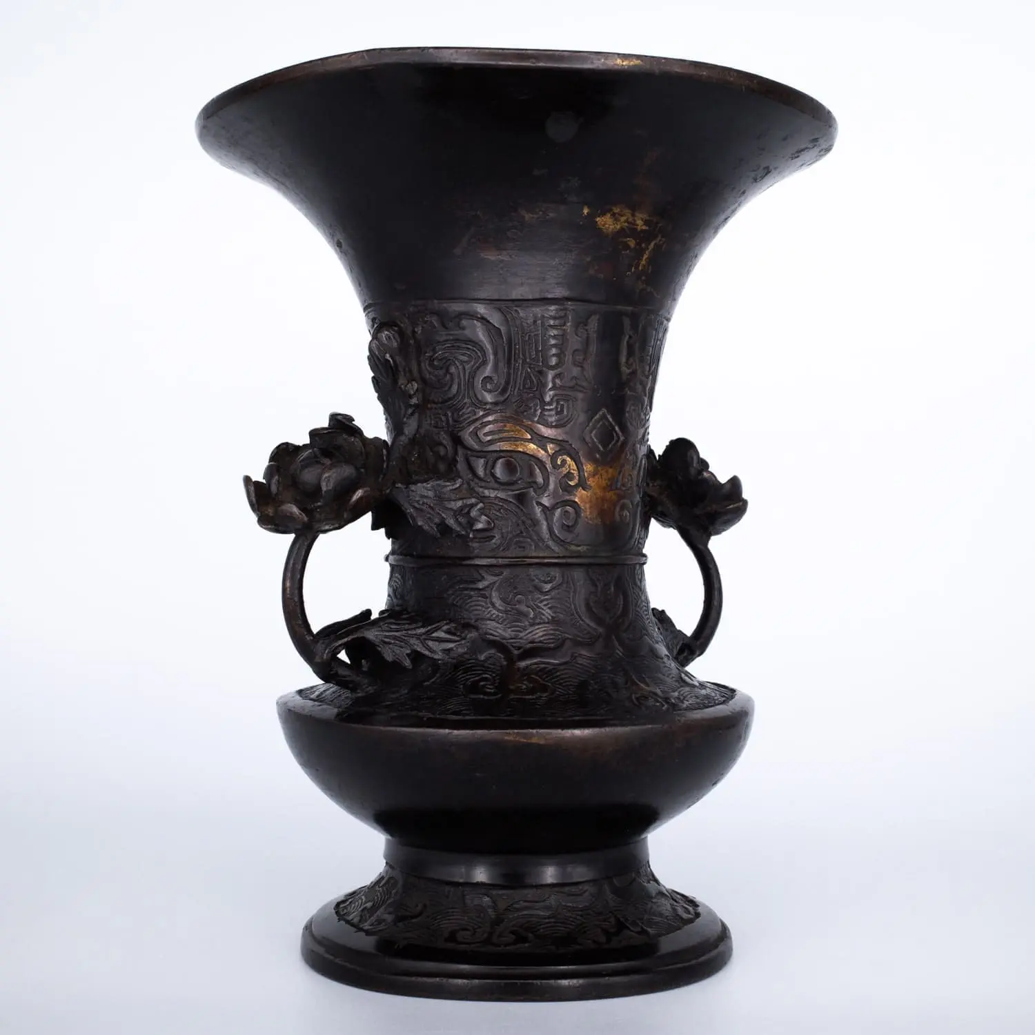 Antique Bronze Gu Form Altar Vase With Taotie Mask Decoration and Floral Handles. 19th century