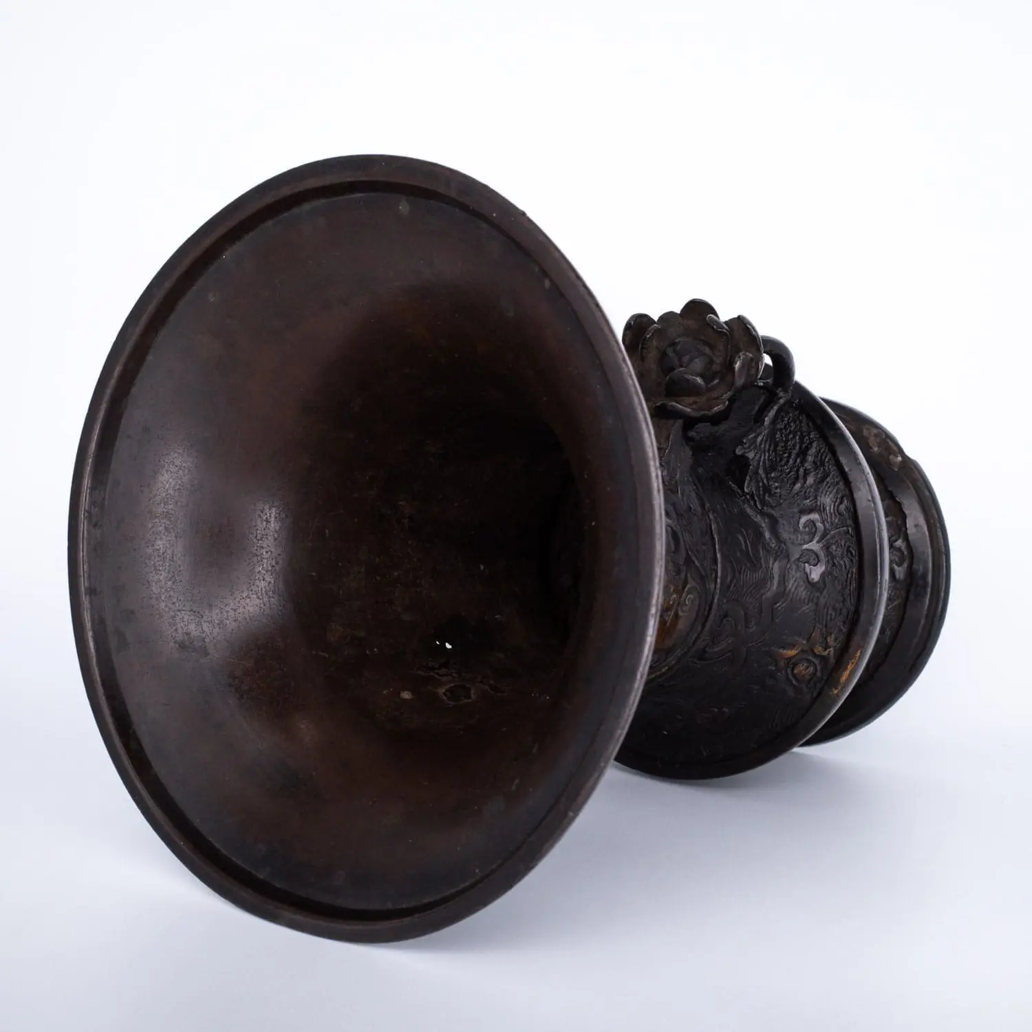 Antique Bronze Gu Form Altar Vase With Taotie Mask Decoration and Floral Handles. 19th century