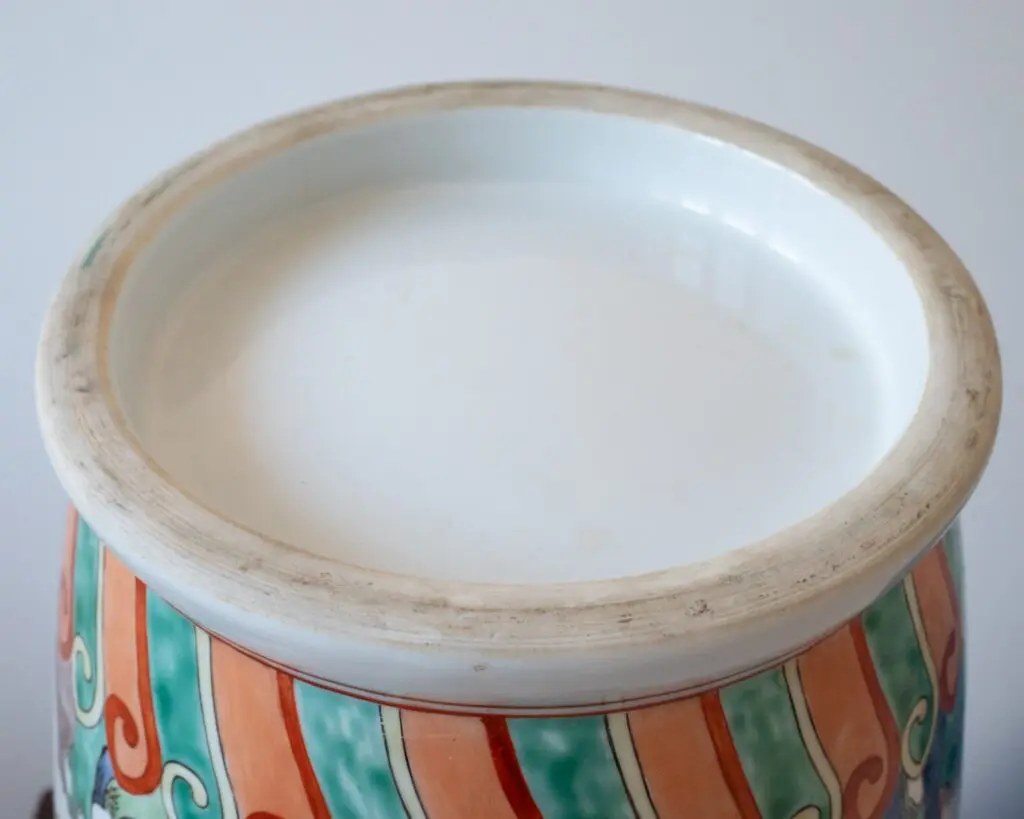 Modern Kangxi style floor vase with figural scenes.