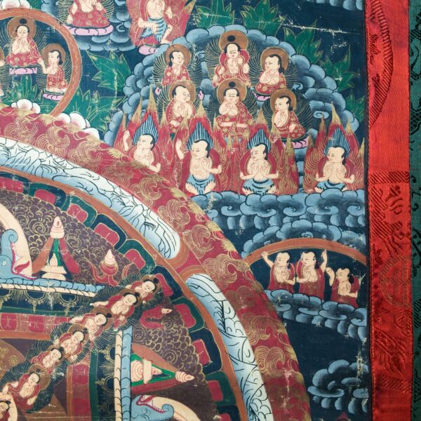Antique Tibetan Buddha Mandala Thangka on linen with silk brocade mount. Nepal, early 20th century