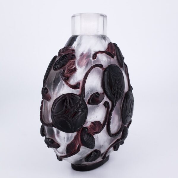 Large Chinese Purple Overlay Peking Glass Snuff Bottle With Auspicious Bats and Coins.