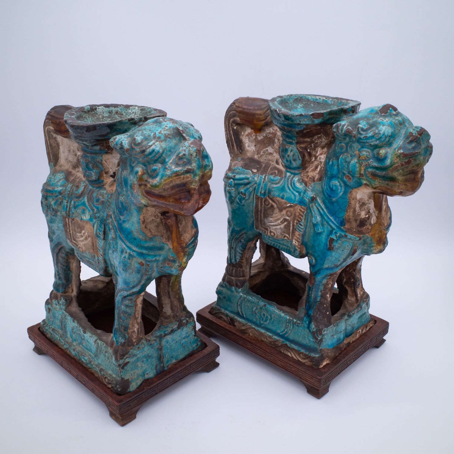 Pair of Chinese Ming Dynasty Turquoise Glazed Foo Lion Joss Stick Holders. 16th-17th century