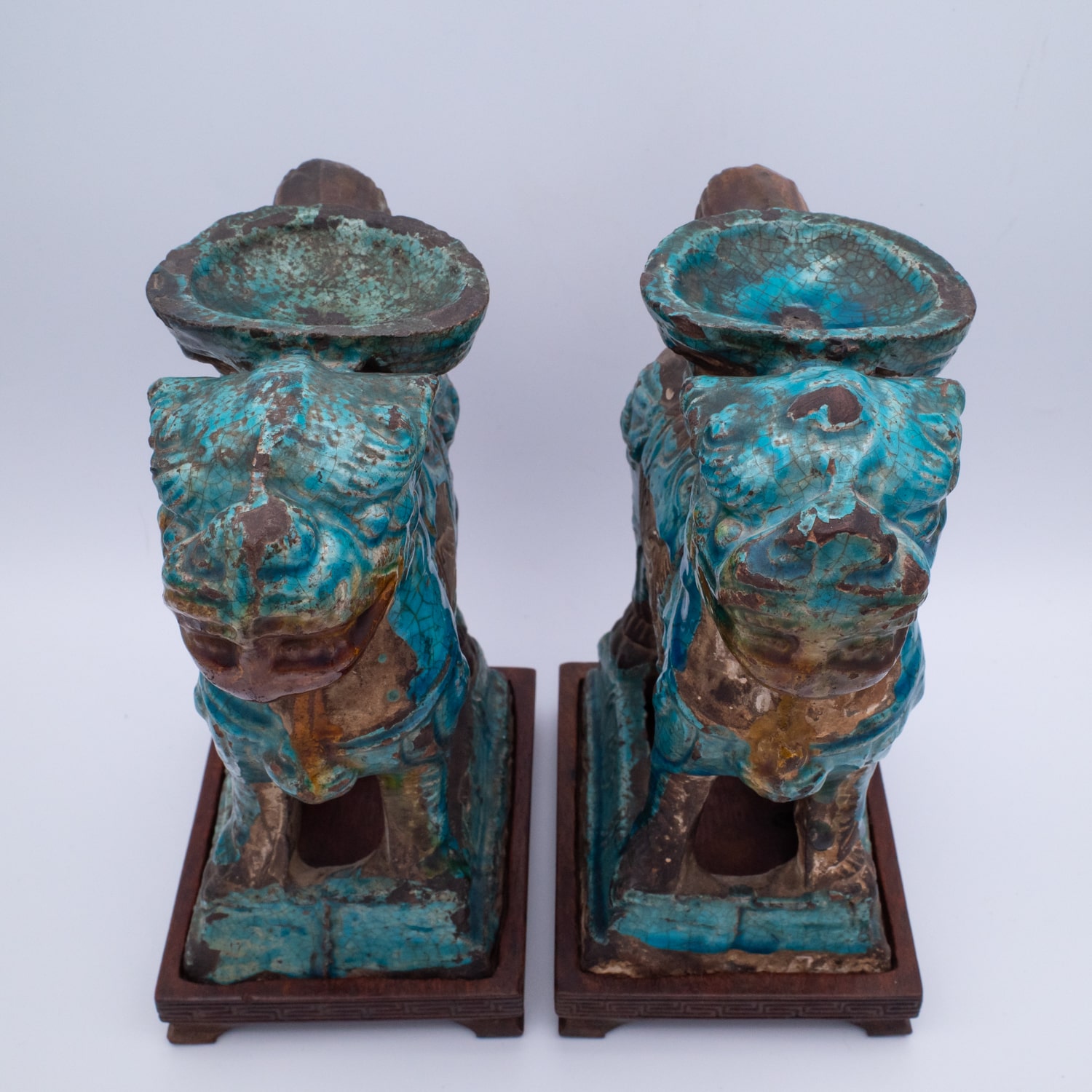 Pair of Chinese Ming Dynasty Turquoise Glazed Foo Lion Joss Stick Holders. 16th-17th century