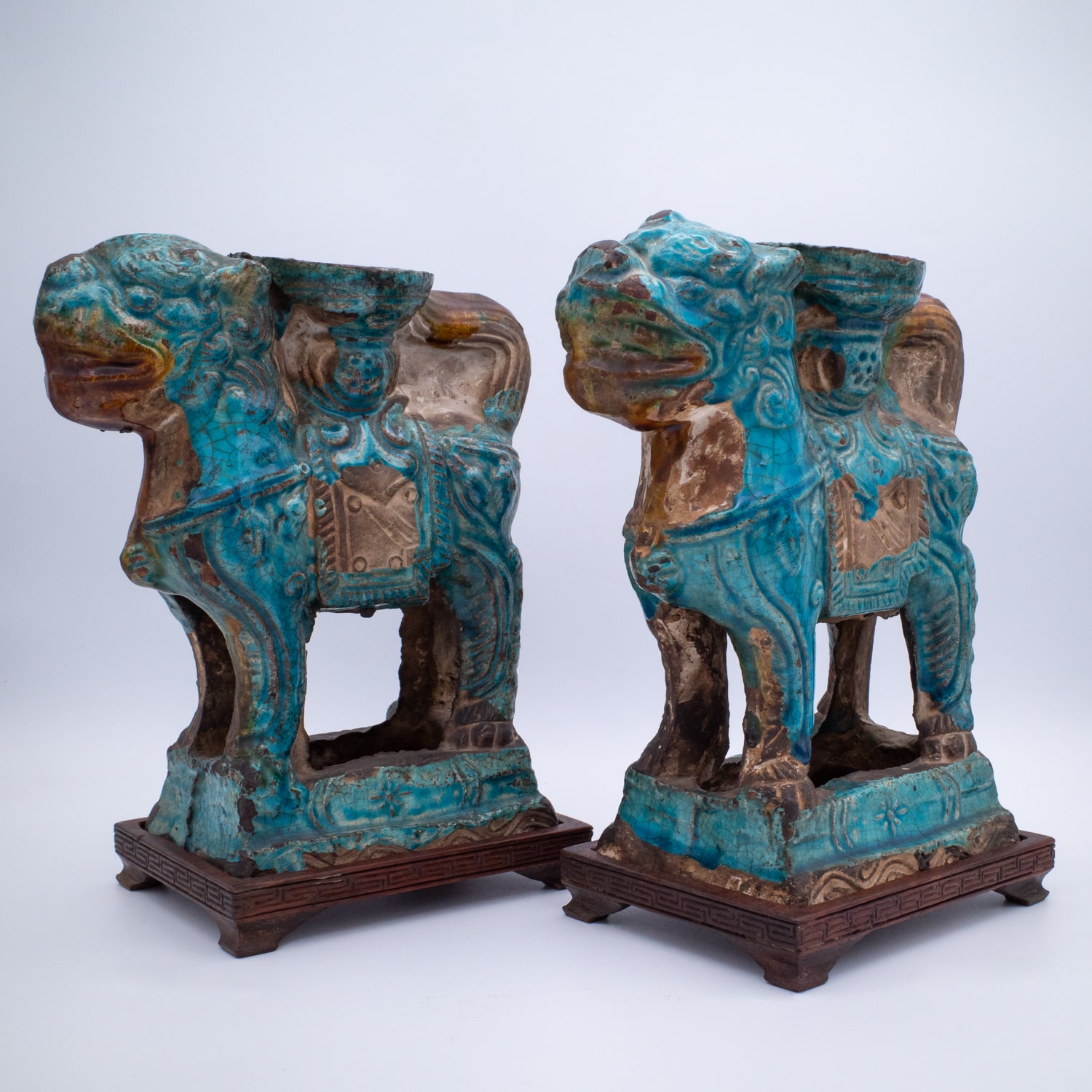 Pair of Chinese Ming Dynasty Turquoise Glazed Foo Lion Joss Stick Holders. 16th-17th century
