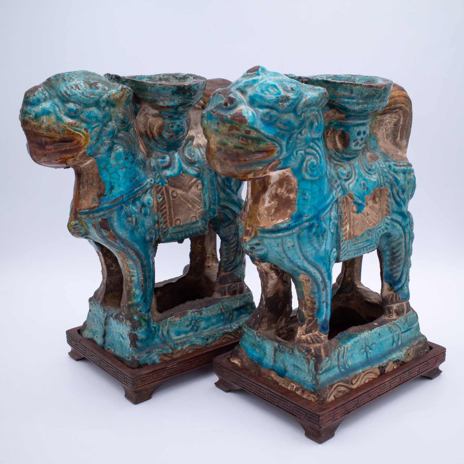 Pair of Chinese Ming Dynasty Turquoise Glazed Foo Lion Joss Stick Holders. 16th-17th century