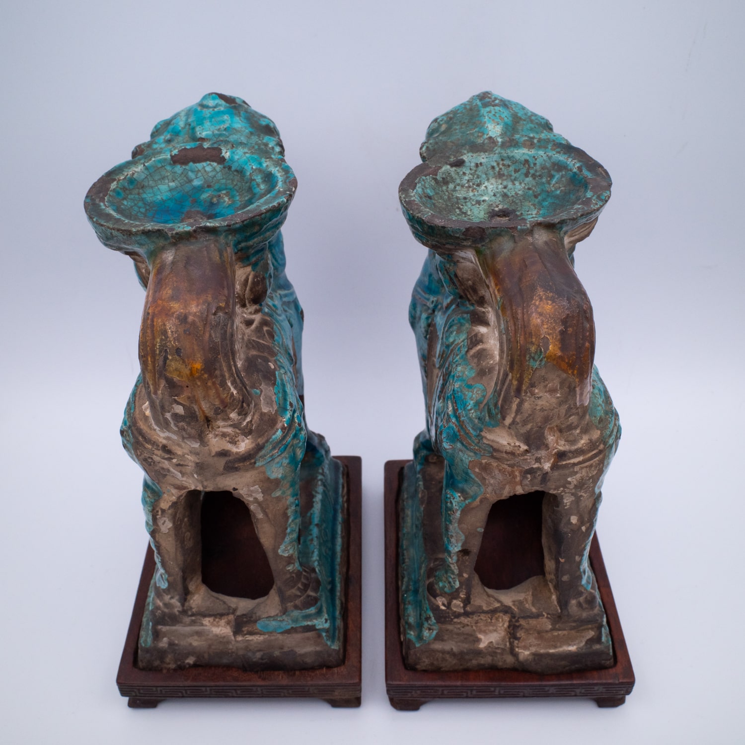 Pair of Chinese Ming Dynasty Turquoise Glazed Foo Lion Joss Stick Holders. 16th-17th century