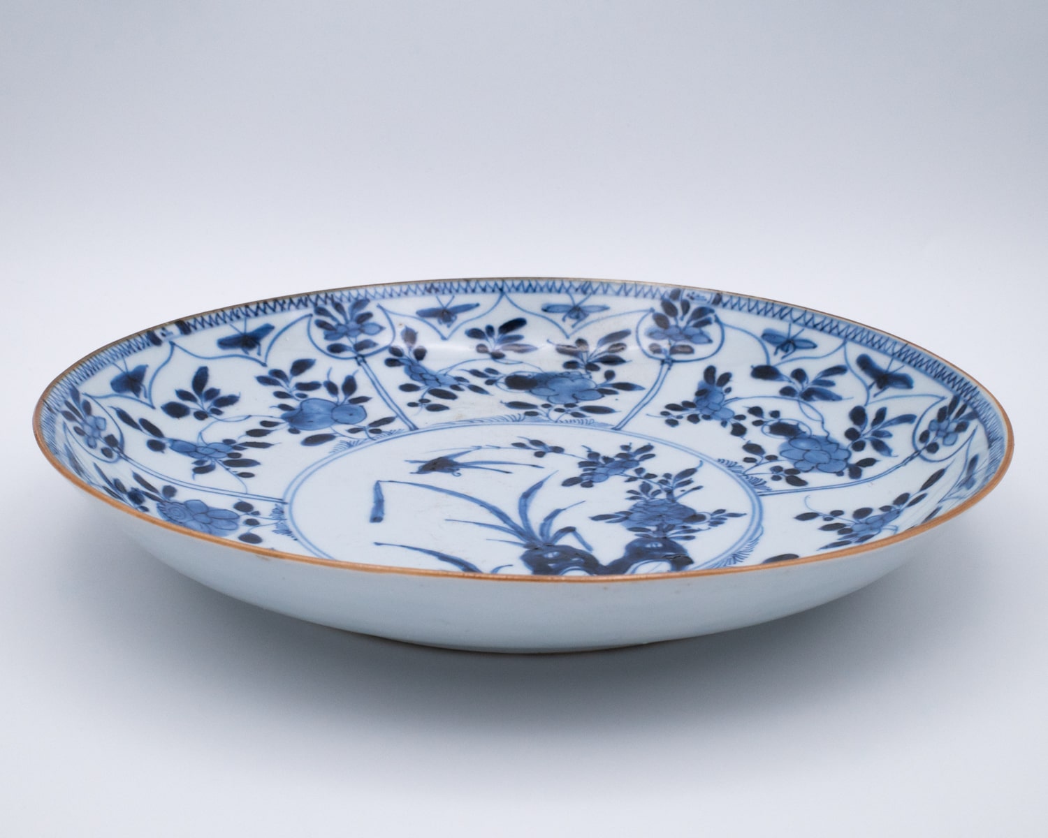 Antique Chinese Blue and White Export Porcelain Dish With Floral Decoration. Early 18th century