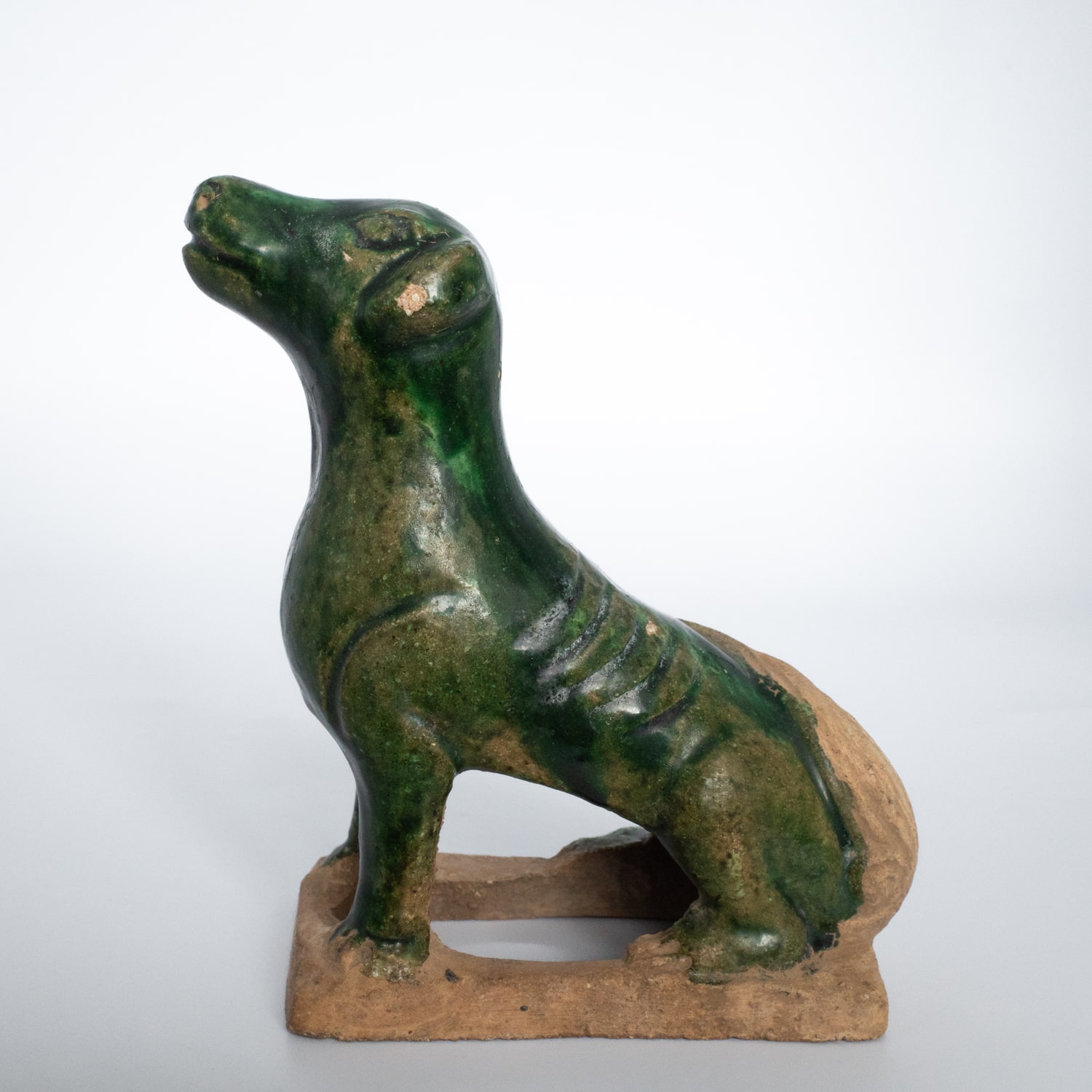 Antique Chinese Green Glazed Pottery Figure of a Seated Dog
